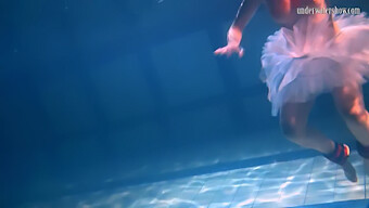 Russian Beauty Bulava Lozhkova In Red Dress And Tie Underwater