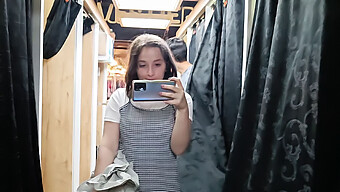 A College Student Receives A Public Blowjob In A Clothes Store