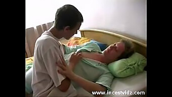 Mature Woman And Young Man Engage In Sexual Activity